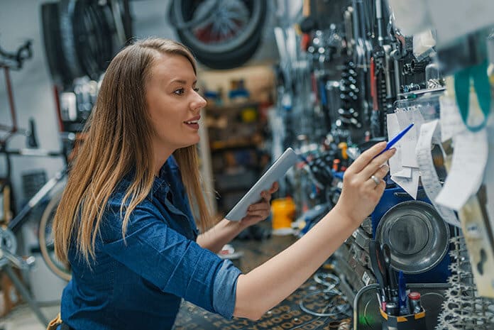 female mechanic with a tablet