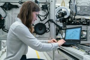 Automotive engineer working on vehicle repair