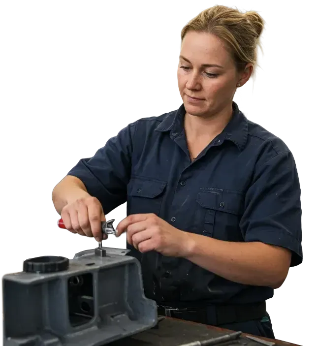 Female mechanic using Workshop Software on a tablet in an automotive repair workshop