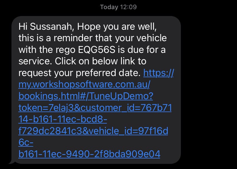 A screenshot of a txt service reminder sent by Workshop Software.